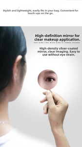 Close-up of portable silver mirror reflecting an eye for precise makeup application