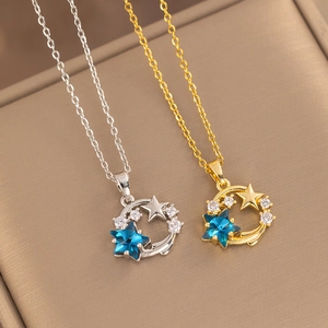Star and moon celestial titanium steel necklace with blue gems in gold and silver finish