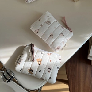 Quilted cotton coin pouches featuring cute cartoon bear and rabbit prints with zip closure