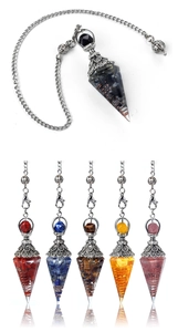 Detailed view of resin pendulum pendants with copper coils and colorful crushed stones