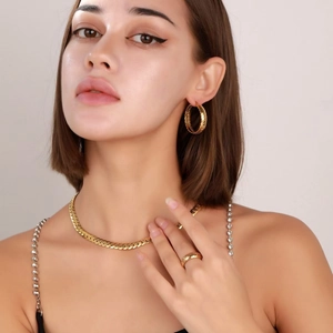 Minimalist gold stainless steel jewelry set with chain necklace, hoop earrings and ring
