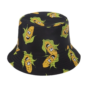 Close-up of black cotton bucket hat with funny cartoon corn prints and green details