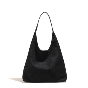 Minimalist black faux suede Hobo shoulder bag with a sleek leather strap for daily commuting