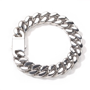Detailed view of polished silver cuban link bracelet with secure box clasp mechanism