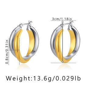 Detailed view of intertwined gold and silver rings earrings with 3cm diameter size markings