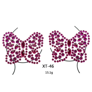 Detail of butterfly-shaped magenta rhinestone body jewelry stickers weighing 15.1g