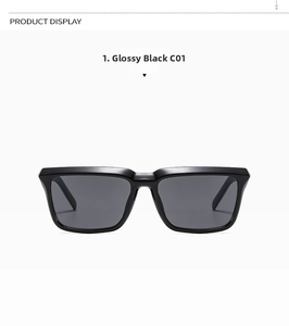 Détail de lunettes de soleil carrées noires avec monture brillante et verres gris foncé
