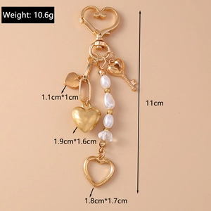 Detailed size and weight specs for the gold heart pearl keychain with charm dimensions