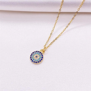 Minimalist S925 silver Evil Eye pendant necklace with blue stones on white textured fabric