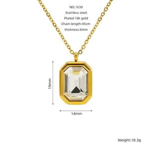 Detail of 18k gold plated stainless steel necklace with a rectangular cubic zirconia