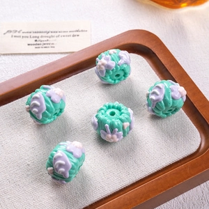 Set of five mint green floral relief beads for DIY jewelry and phone chain making