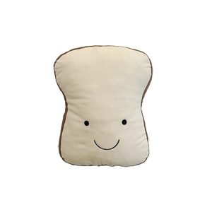 Plush toast bread pillow with cute smiling face and brown edge for home decoration