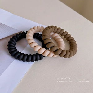 Matte spiral hair ties set in black, beige and coffee colors for women styling