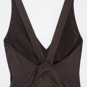 Elegant backless satin sleeveless maxi dress featuring a deep V-neck and front knot design