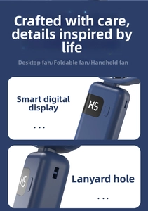 Detail view of the digital LED display and lanyard hole on the navy blue portable fan