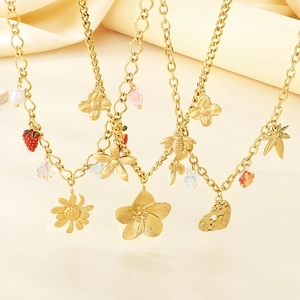 Golden stainless steel necklace featuring sunflower bee and heart charms on silk