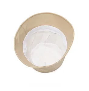 Internal view of beige PU leather bucket hat showing fabric lining and sweatband details