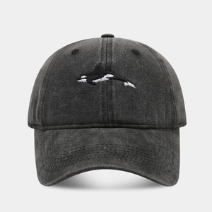 Vintage dark gray washed cotton baseball cap featuring detailed orca whale embroidery