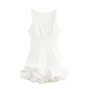 Detailed back view of white sleeveless backless dress with feminine ruffle hem detailing