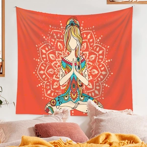 Cozy bedroom setting with a bohemian meditation tapestry hanging above the bed