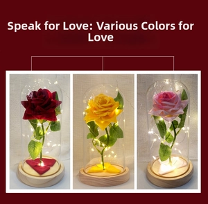 Close-up of LED artificial roses in glass domes with wooden base for romantic gifts