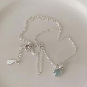 Minimalist 925 sterling silver necklace featuring a round light turquoise gemstone pendant
