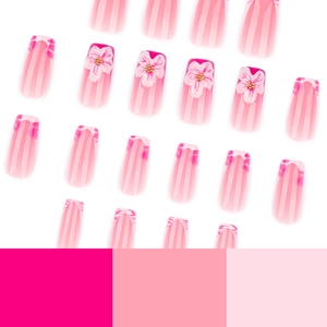 French pink zebra press-on nails with 3D floral accents and gold beads in medium square shape