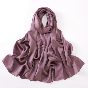 Detailed view of dark mauve chiffon silk scarf showing its soft texture and elegant drape