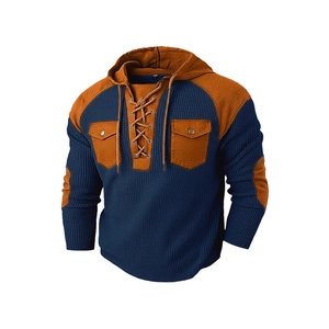 Men's navy and orange knit hoodie with drawstring and pockets on a white background