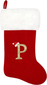 Detail of red velvet Christmas stocking with white plush cuff and gold letter P
