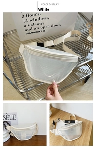 Close-up of a clear PVC chest bag with beige trim and adjustable buckle strap detail