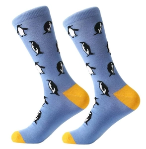 Light blue crew socks featuring penguin patterns with yellow toe and heel accents