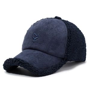 Navy blue teddy fleece and suede baseball cap with embroidered logo for winter warmth
