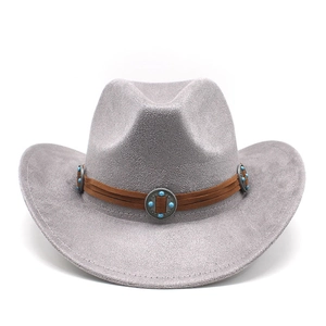 Detail of grey suede fedora hat with brown leather band and turquoise metal studs