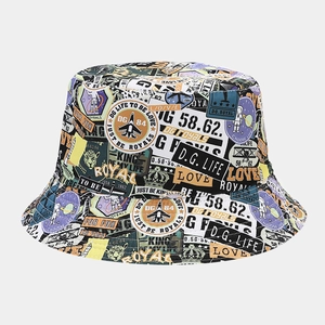 Detail shot of graffiti canvas bucket hat showing astronaut icons and artistic lettering