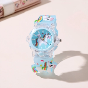 Detail of light blue unicorn kids watch featuring luminous LED dial and silicone strap