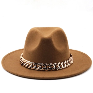 Close-up of brown wool felt jazz hat featuring a decorative gold metal chunky chain band