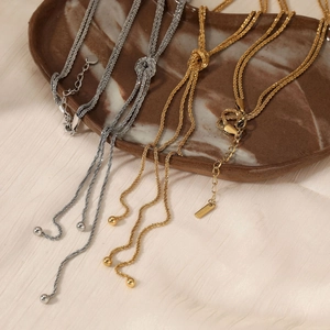 Elegant multi-layer Y-shaped stainless steel long chain necklace with gold and silver ball charms