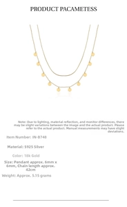 Detail of double-layer S925 sterling silver necklace with sequins and snake bone chain