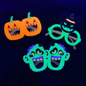 Glow-in-the-dark Halloween party glasses with neon pumpkin and spider felt frames