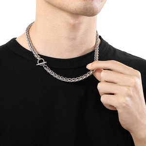 Silver stainless steel wheat chain necklace with OT toggle clasp worn by a male model