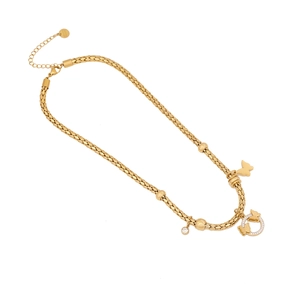Gold butterfly pendant necklace with crystal charms on a flat snake bone chain style