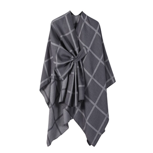 Soft dark grey plaid shawl cape with an elegant bow accent and irregular hemline