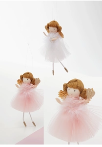 Close-up of plush angel dolls with fluffy yarn skirts and golden wings for Christmas decor