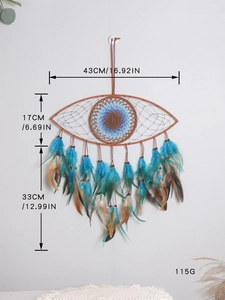 Detail view of Evil Eye dreamcatcher showing 43cm width and feather tassel dimensions