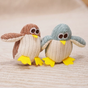 Knitted penguin plush catnip toys in brown and blue colors for kittens