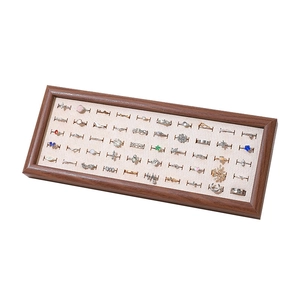 Walnut wood jewelry display tray with beige velvet slots for ring storage and exhibition