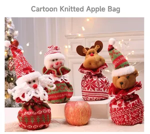 Knitted Christmas gift bags featuring Santa, snowman, and reindeer festive designs