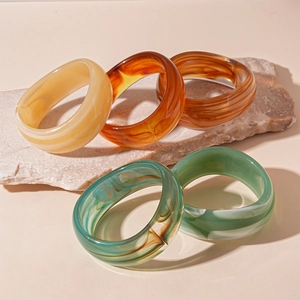 Statement acrylic wide cuff bracelet with vintage marble texture in earthy tones