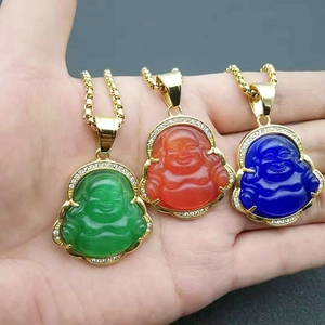 Detailed close-up of laughing Buddha pendants in green, orange, and blue with gold plating